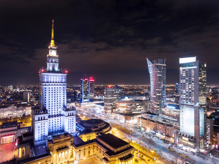 Fototapety  Aerial view of Warsaw downtown and The Palace of Culture and Science in Warsaw at night. Poland.