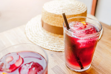 Sangria spanish fruit drink on a table with hat