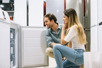 Customers in an appliance shop