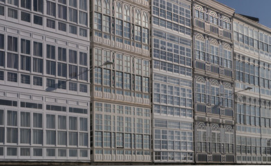 Fototapeta na wymiar Glass fronted flats in La Coruna