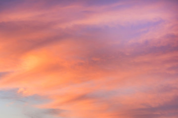 Naklejka na ściany i meble Sky in the pink and blue colors. effect of light pastel colored of sunset clouds cloud on the sunset sky background with a pastel color 