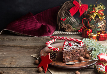 Slice of sweet chocolate cake for Christmas Eve.