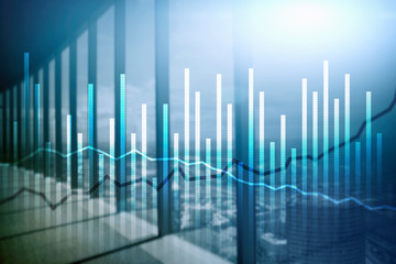 Double exposure Economics growth diagrams on blurred background. Business and investment concept.