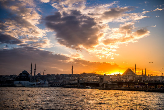 sunset istanbul. Suleymaniye mosque and Galata bridge background