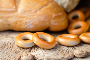 Loaf of white wheat bread, bagels and buns. Close up. Home bakery. Homemade