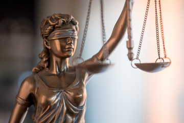 Statue of Justice with scales in lawyer office. Legal law, advice and justice concept - 230865275