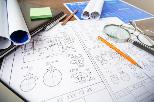 
Architectural blueprints - drawings, pencil, calculator, calculations, plan, ruler, computer. Business and science. 