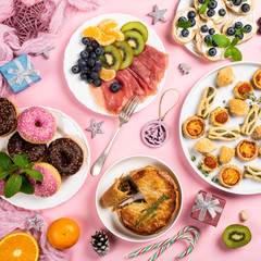 Christmas dinner party table, holiday food concept background, top view, flat lay