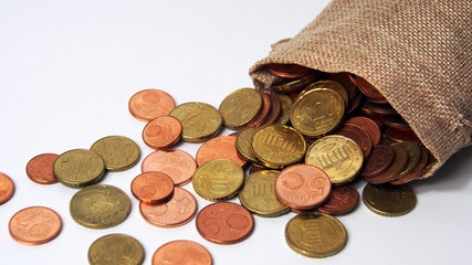 different coins in a little bag