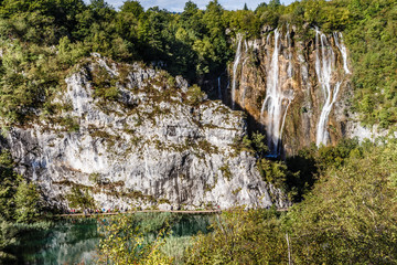 Fototapeta na wymiar nature park with several waterfalls; nature landscape in the mountains with waterfalls in the summer