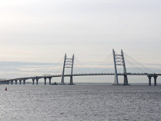 Obraz premium Seascape with cable-stayed bridge