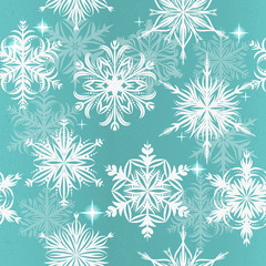 Seamless vector background with snowflakes on a blue background