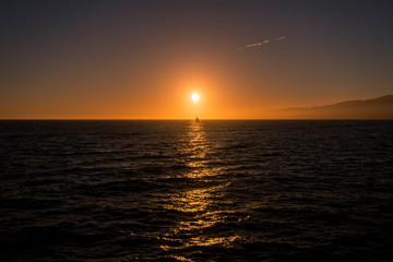 sunset seascape with boat