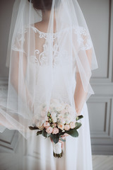 Bride with a wedding bouquet