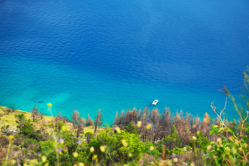 Fototapeta na wymiar View from the high mountains on the azure Mediterranean sea.