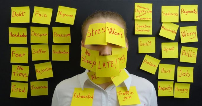 Portrait of a beautiful girl under stress in modern office life