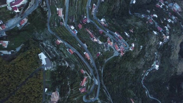 Overhead aerial, cliffside town in Italy