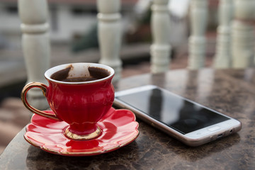 Turkish coffee in the red cup for cafe concept.