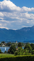Fototapeta na wymiar Smartphone HD wallpaper of beautiful alpine view at the Chiemsee - Gstadt - Bavaria