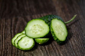 ripe cucumber lies on the table