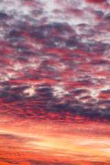 Colorful sunset sky over tranquil sea surface