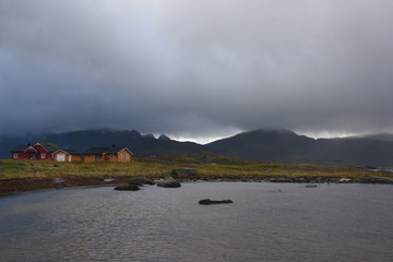 Houses in Ramberg during a storm, Lofoten, Norway