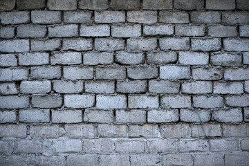 Background - the fragment of a brick wall.