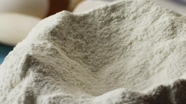Close-up flour. Scene. Concept of cooking. Preparation of homemade cakes from white flour
