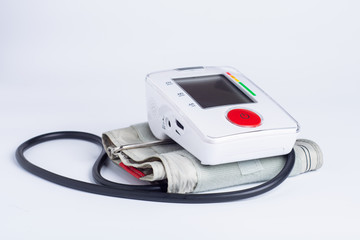 white electronic tonometer on a white background