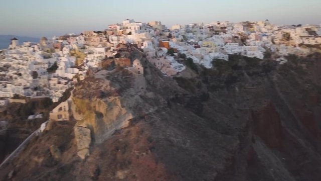 Byzantine Castle Ruins on cliffs at sunset, aerial