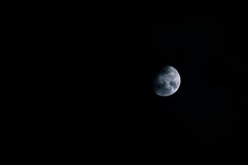 beautiful moon shining on black sky background