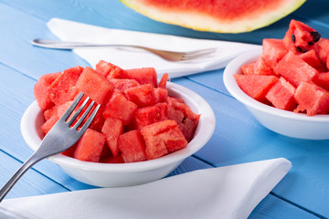 Watermelon cut into cubes on a plate