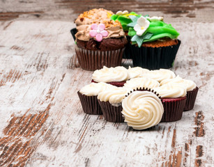 Cupcakes surrounded by rustic background
