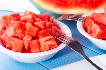 Watermelon cut into cubes on a plate