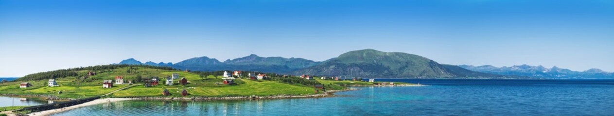 Picturesque panoramic view of houses in Holdoya Island which is part of Lofoten archipelago in Norway. The landscape of Norway in the summer.