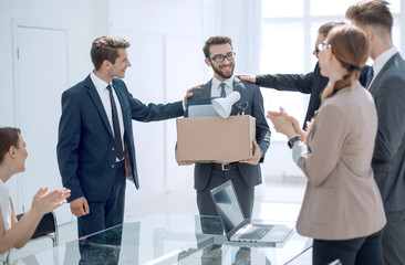 business team congratulating a new employee with a raise