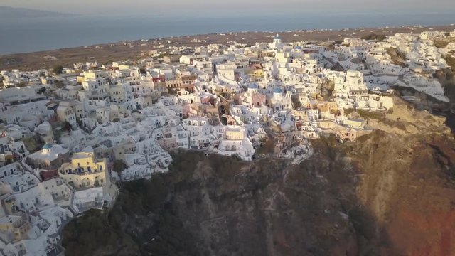 Sunset over town of Oia, aerial
