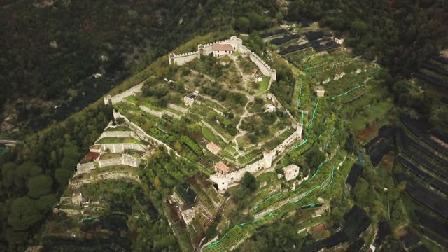 Castello di San Nicola Thoro-Plano in lush mountains, aerial