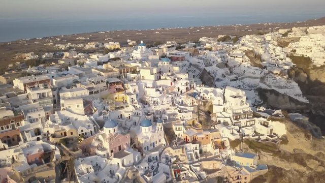 Aerial, sunset over town of Oia