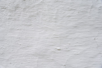 Adobe whitewashed wall, retro background with detailed texture, white color