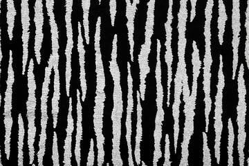 Black fabric with metallic zebra pattern