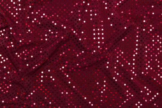 Dark Red Fabric With Sparkling Metallic Dots Design