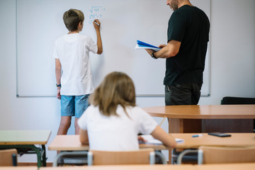 Obraz premium Couple young students studying at school