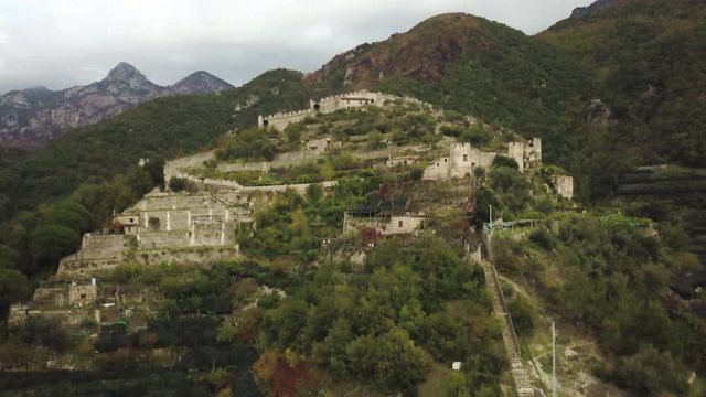 Aerial, Castello di San Nicola Thoro-Plano in lush mountains