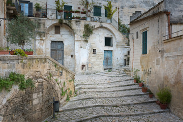 Fototapeta na wymiar The Sassi of matera, ancient town, matera landscape by day, details of the Sassi of Matera, ancient city, landscape by day, historical center