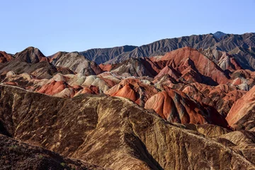 Deurstickers Zhangye Danxia Zhangye Danxia National Geopark - Gansu Province, China. Chinese Danxia multicolor danxia landform, rainbow hills, unusual colored rocks, sandstone erosion, layers of Red, Yellow and Orange stripes.
