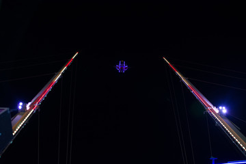 People are having fun in reverse bungee jumping in amusement park