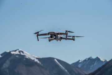 Naklejka na ściany i meble Drone in the mountains