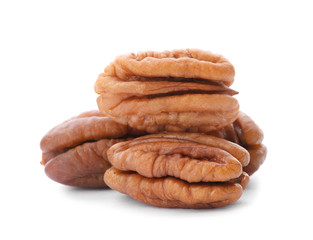Heap of ripe shelled pecan nuts on white background