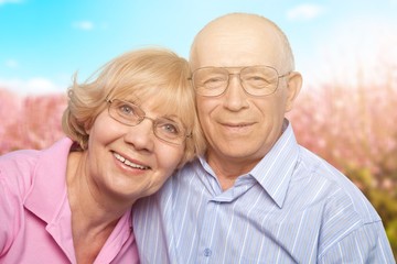 Portrait of happy senior couple smiling